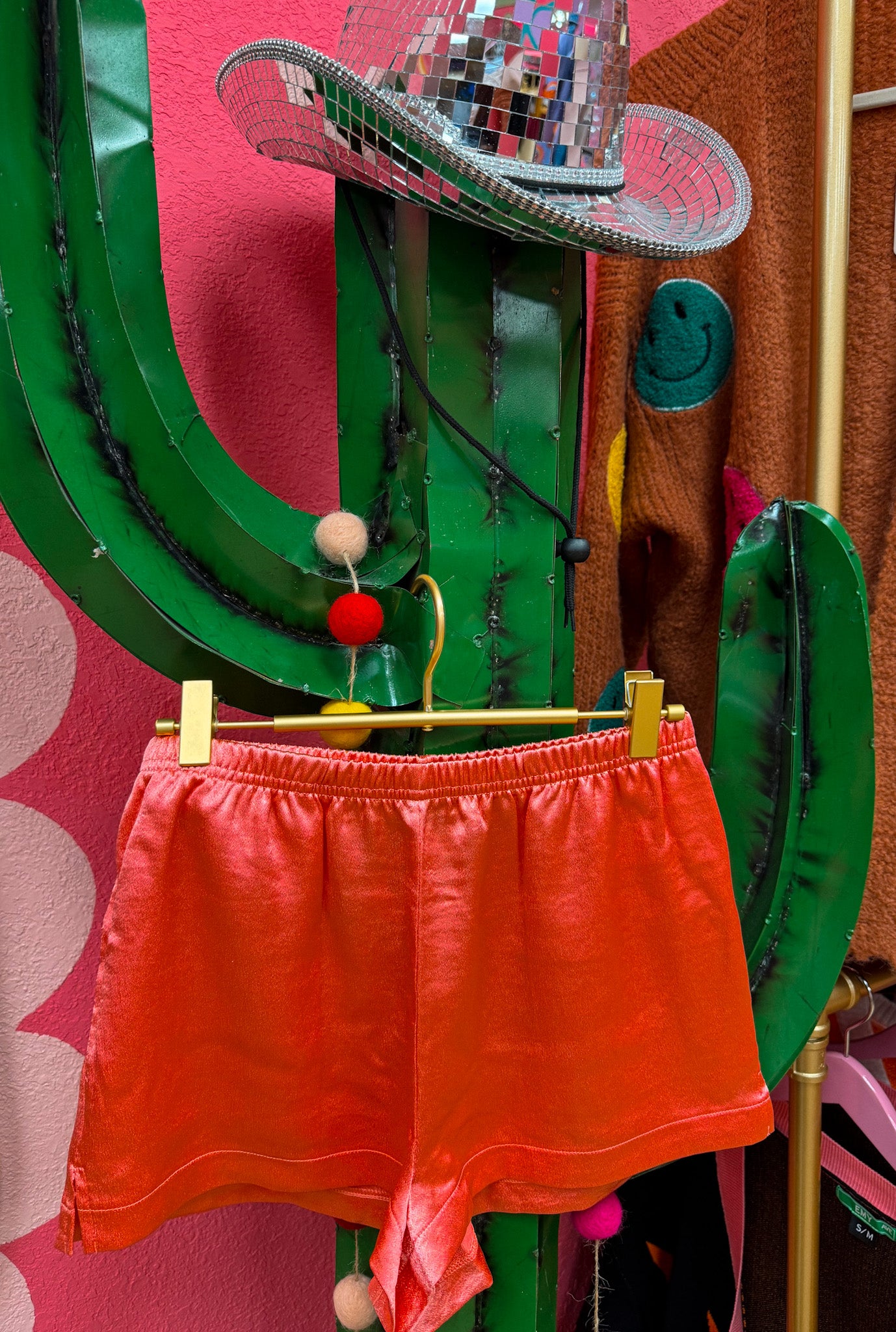 pastel red silk shorts