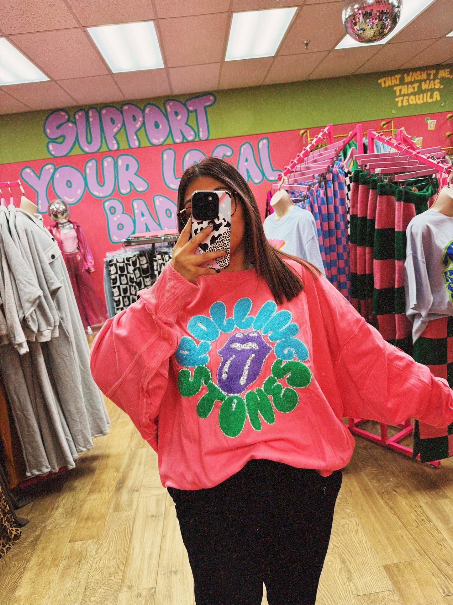 pink rolling stone sweatshirt